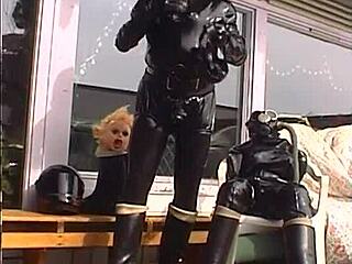 Roxina in retro rubber outfit, feeling horny in shiny material