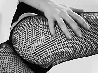 German brunette teases ass and feet in fishnets