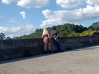 Blonde in skirt gets doggystyle sex on the road, gaping and cum in mouth