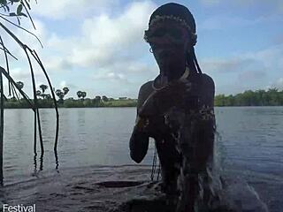 hot skinny african village girl strolls naked, maybe seeking some action.