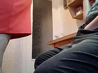 Stepmom masturbates in kitchen with clothes on.