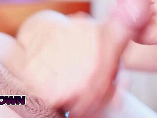 She gives close-up blowjob on bed with handjob and fingering. Cum in mouth action.