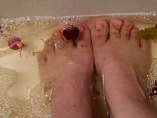 Washing feet with rose petals after hard work
