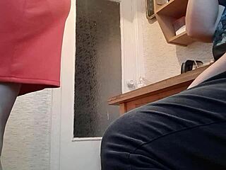 Stepmom masturbates in kitchen with clothes on.