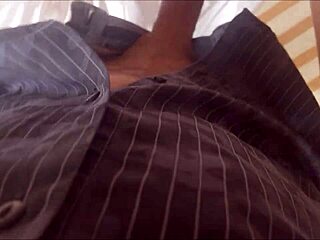 Sexy milf in black thong gives blowjob.