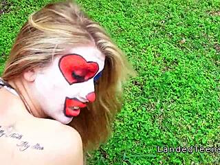 Teen in clown costume banging outdoor to cumshot