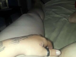 A woman engages in self-pleasure through masturbation