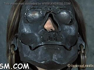 shocking treatment on restrained woman's breasts and shaved area