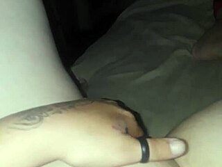 A woman engages in self-pleasure through masturbation