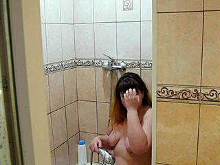 Watch this chubby milf wash and shave in the shower