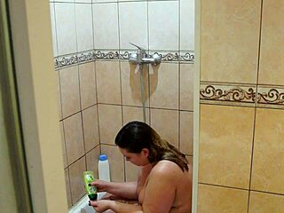Watch this chubby milf wash and shave in the shower