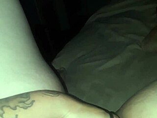 A woman engages in self-pleasure through masturbation