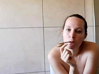 Cute skinny babe smoking in bathroom next door, homemade style 😏