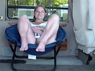 Some guy's horny wife flashes on the beach.