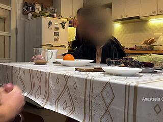 my husband jerking under a table front of my step mom and i right at the kitchen