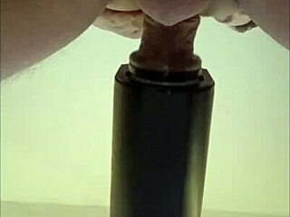 In this homemade solo session, she gets milked by a remote sextoy with a POV cumshot from down under.