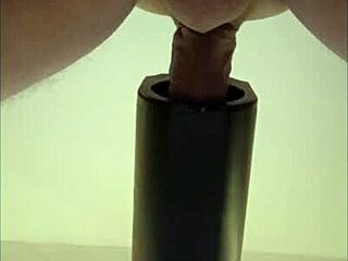 In this homemade solo session, she gets milked by a remote sextoy with a POV cumshot from down under.