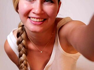 Flexible babe masturbates on a soft couch.