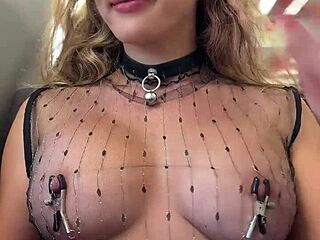 on train in sheer top playin with my pierced nipples while people behind me