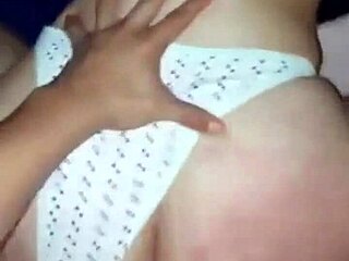 thong pushed aside, cock buried deep inside