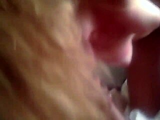blonde gf gives blowjob with handjob. she takes cumshot facial on her tits in homemade video.