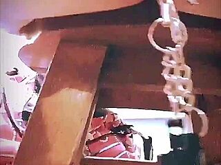 big pink pussy lips dangled and stretched down with weights in close up