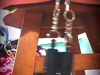 big pink pussy lips dangled and stretched down with weights in close up