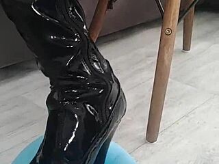Veve Pops Balloons in Latex Stockings Using Sharp Object with Her Big Tits Exposed