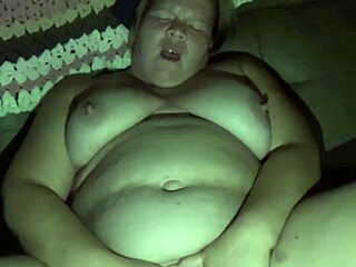 Milf cums while sticking dildo in pussy