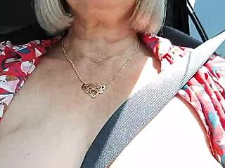 Riding down the road, my tits fully out