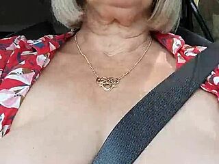 Riding down the road, my tits fully out