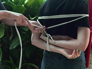 I punish her by tickling her cute feet outdoors