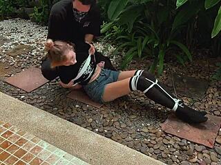 I punish her by tickling her cute feet outdoors