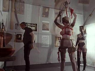 submissive bondage puppet rebel rhyder sucks cock and eats ass in a demented threesome game, getting spanked and dominated by maledom master.