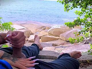 hey, check out this surprise cumshot handjob on the beach with outdoor masturbation