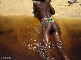 Journalist films African tribe but ends up with cock ridden by horny ebony village girl in water