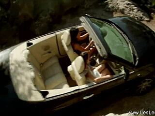 Blonde amateur starts fingering and licking mature shemale's pussy. They kiss and striptease with clothes ripped in lesbian session.