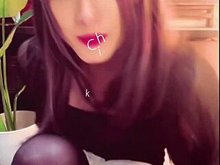 Quiet Black-Haired Crossdressing Ladyboy Masturbates in Public Toilet Setting