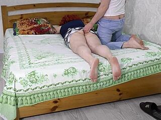 Stepmom positions herself on bed for stepson to fuck her big ass and tits