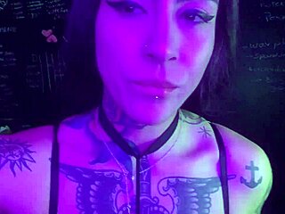 Lexi smokes while using her toy