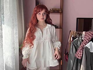 Curly redhead college student dressed as a bookworm nerd in lingerie and stockings poses solo in the library setting