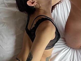 Petite Colombian lingerie model gets bent over for backstage anal sex in vertical POV view.