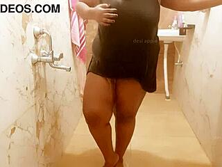 The horny milf sneaks around showing off her big boobs in a teasing display.