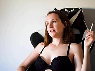 Busty Brunette Babe With Blue Eyes And Cute Petite Figure Smokes In Black Bra