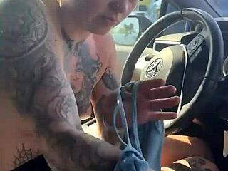 Girl attempting to adjust her sports bra in the gym parking lot