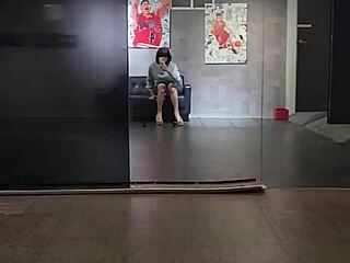 Shemale ting xuan masturbates outdoors in hotel public area wearing heels and showing long legs