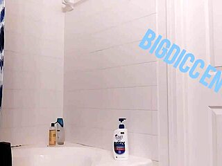 Stroking hard dick during homemade shower session