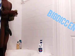 Stroking hard dick during homemade shower session