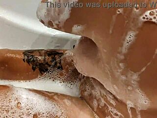 Hot tanned stepsister relaxes in bathroom after turkey vacation with amateur girlfriend vibes.