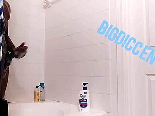 Stroking hard dick during homemade shower session